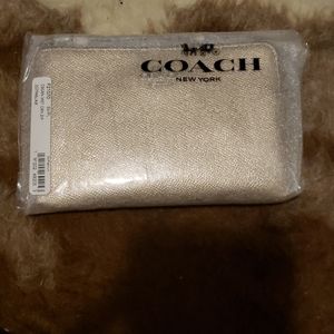 Coach wristlet champagne